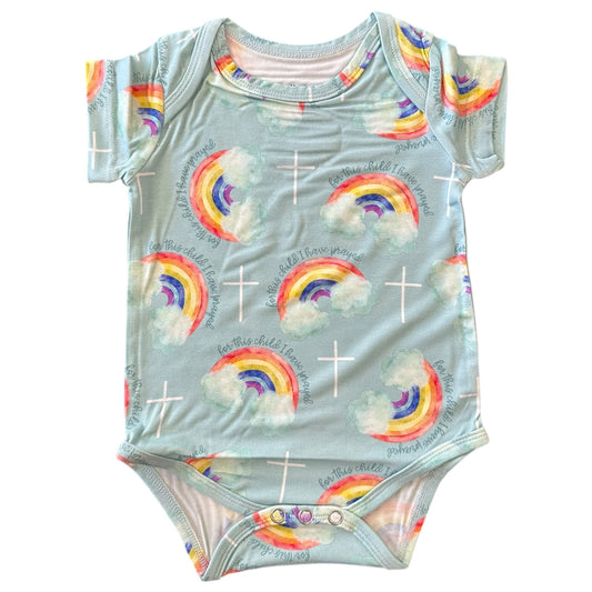 Bamboo bodysuit for babies featuring colorful rainbows and crosses with the text 'For This Child I Have Prayed'.