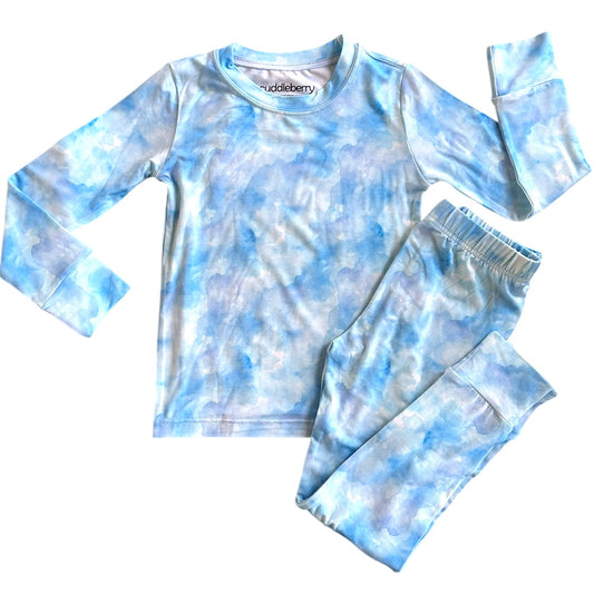 Blue Skies long sleeve two-piece pajamas for kids in soft bamboo fabric, featuring a light blue watercolor design.
