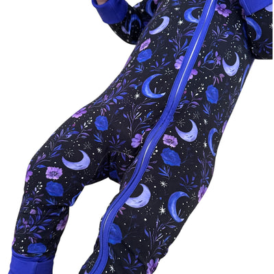 Purple Moonbeam bamboo zipper sleeper for babies, featuring vibrant moon and floral design.