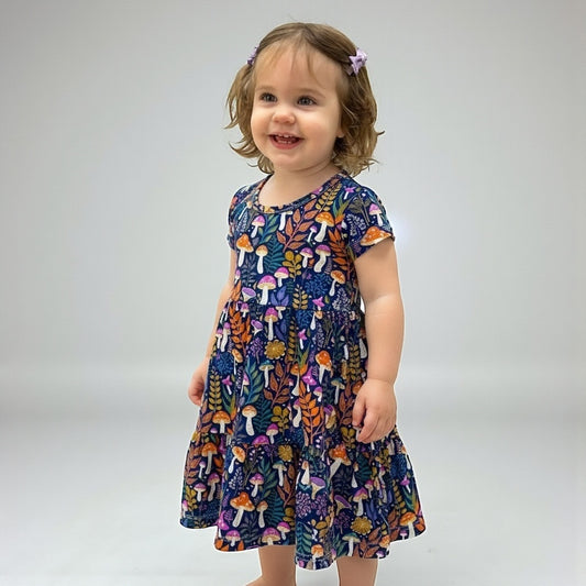 toddler girl wearing cuddleberry bamboo dress in Botanical mushroom design