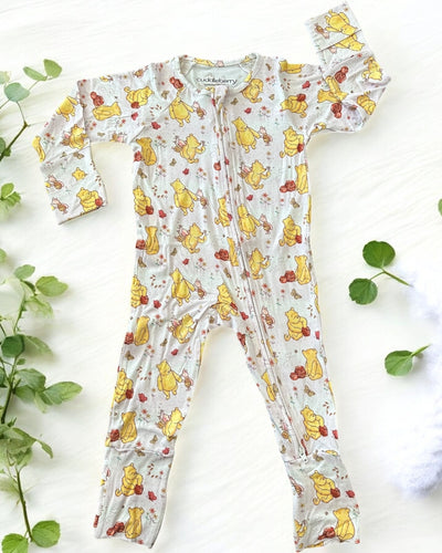 Classic Pooh zipper sleeper for babies with playful Winnie the Pooh design, crafted for comfort and ease.